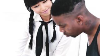 Japanese tutor tries to tame a ebony anaconda