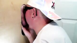 Lustful dude with glasses enjoys in a glory hole scene