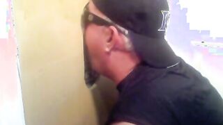 Two sexy visitors take turns for a sexy glory hole blowjob