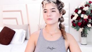 University bitch with pony tails shows shows us her perfect boobs.