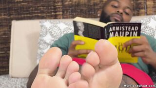 Ebony jock Dallas shows off his size 12 feet in dirty socks