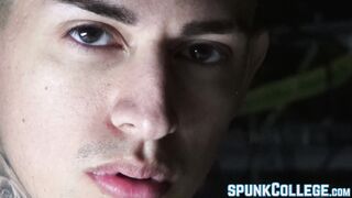 Tattooed twink teasing while stroking meat passionately solo