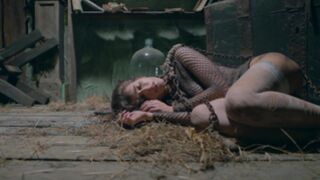 Chained slavegirl Emily J rams her cunt with a bottle