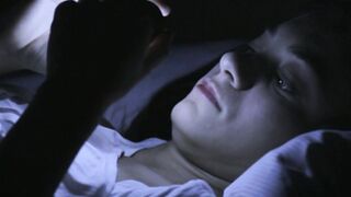 Naughty Sima B uses a handheld light to fuck her twat